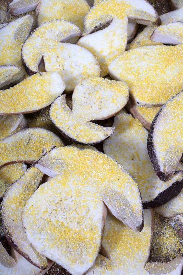 Preparation of the porcini mushroom before frying Stock Photo by